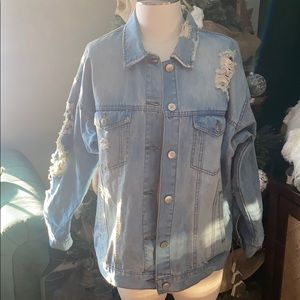 Light wash distressed denim jacket